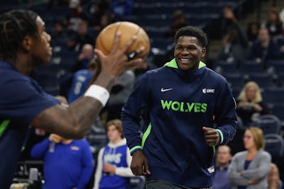 Minnesota Timberwolves guard Anthony Edwards smiles during warm ups prior to an NBA basketball game against the Houston Rockets, Saturday, Nov. 5, 202
