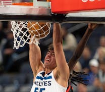 Wolves center Luka Garza dunks against Toronto on April 3 at Target Center.