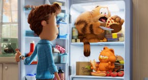 Jon (voiced by Nicholas Hoult), Vic (voiced by Samuel L. Jackson) and Garfield (voiced by Chris Pratt) in "The Garfield Movie."