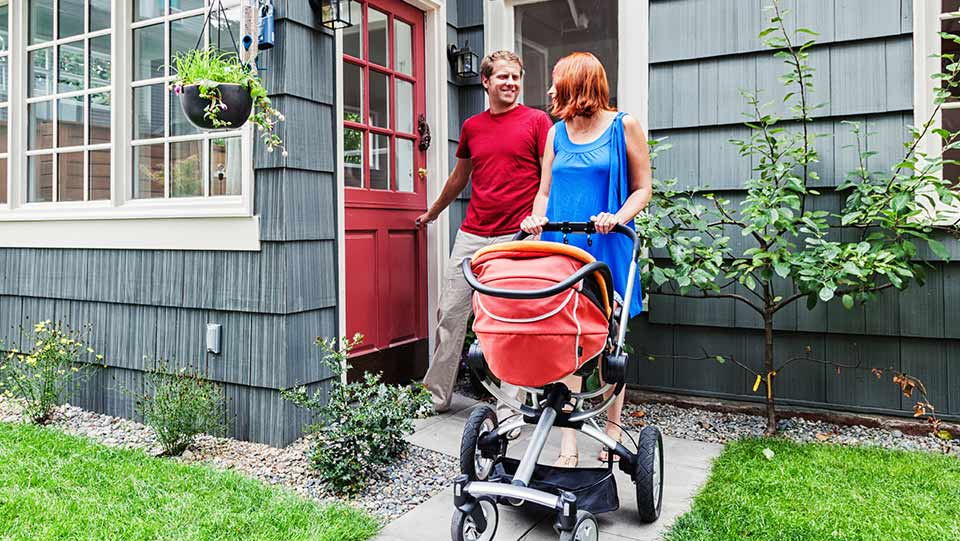 Family locking up home as part of home security checklist.