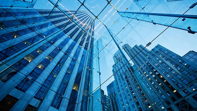 Upward view of financial institution skyscrapers.