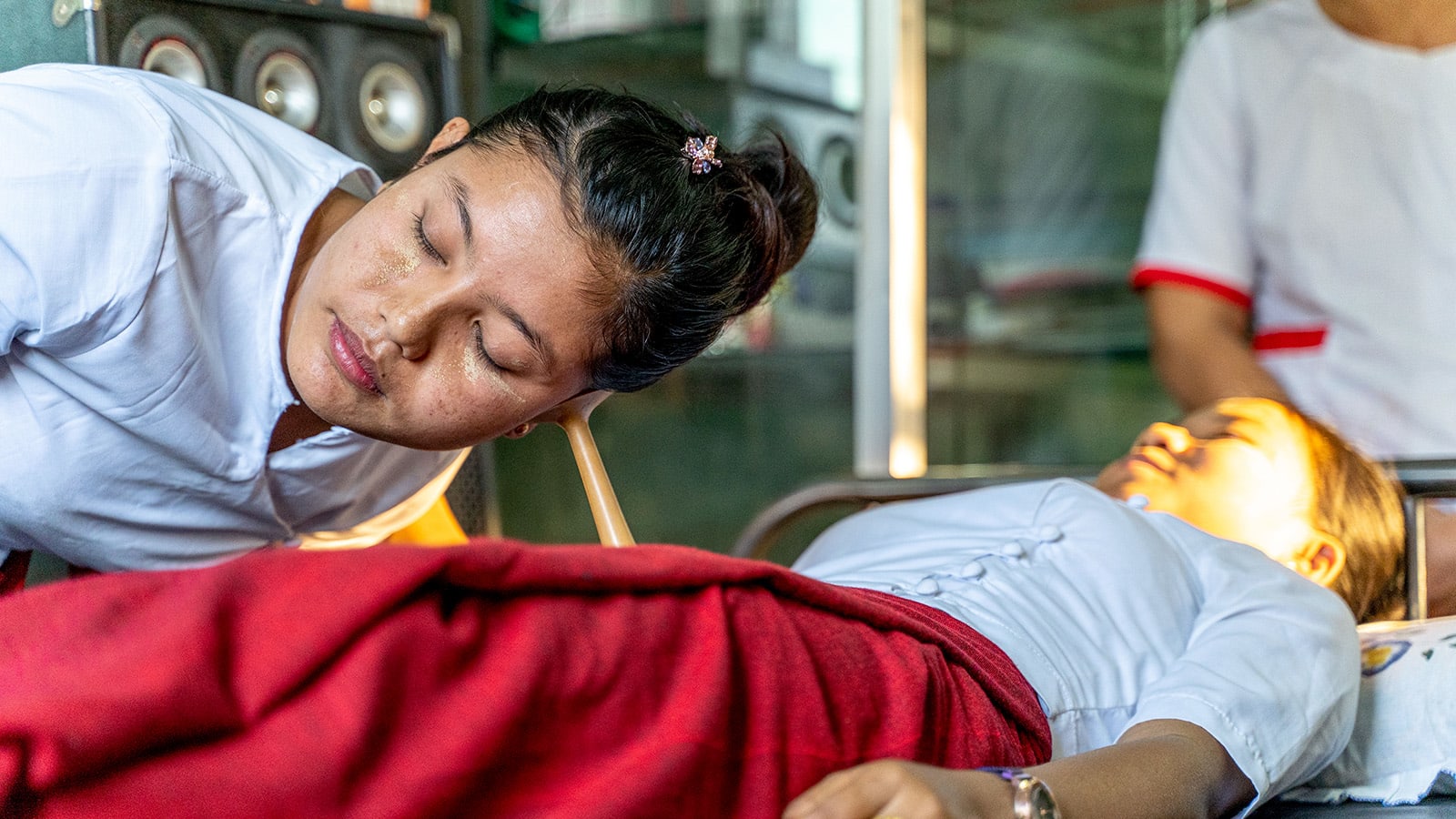 physician doing a health check with a child