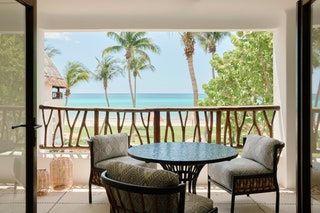 A hotel balcony on the ocean.