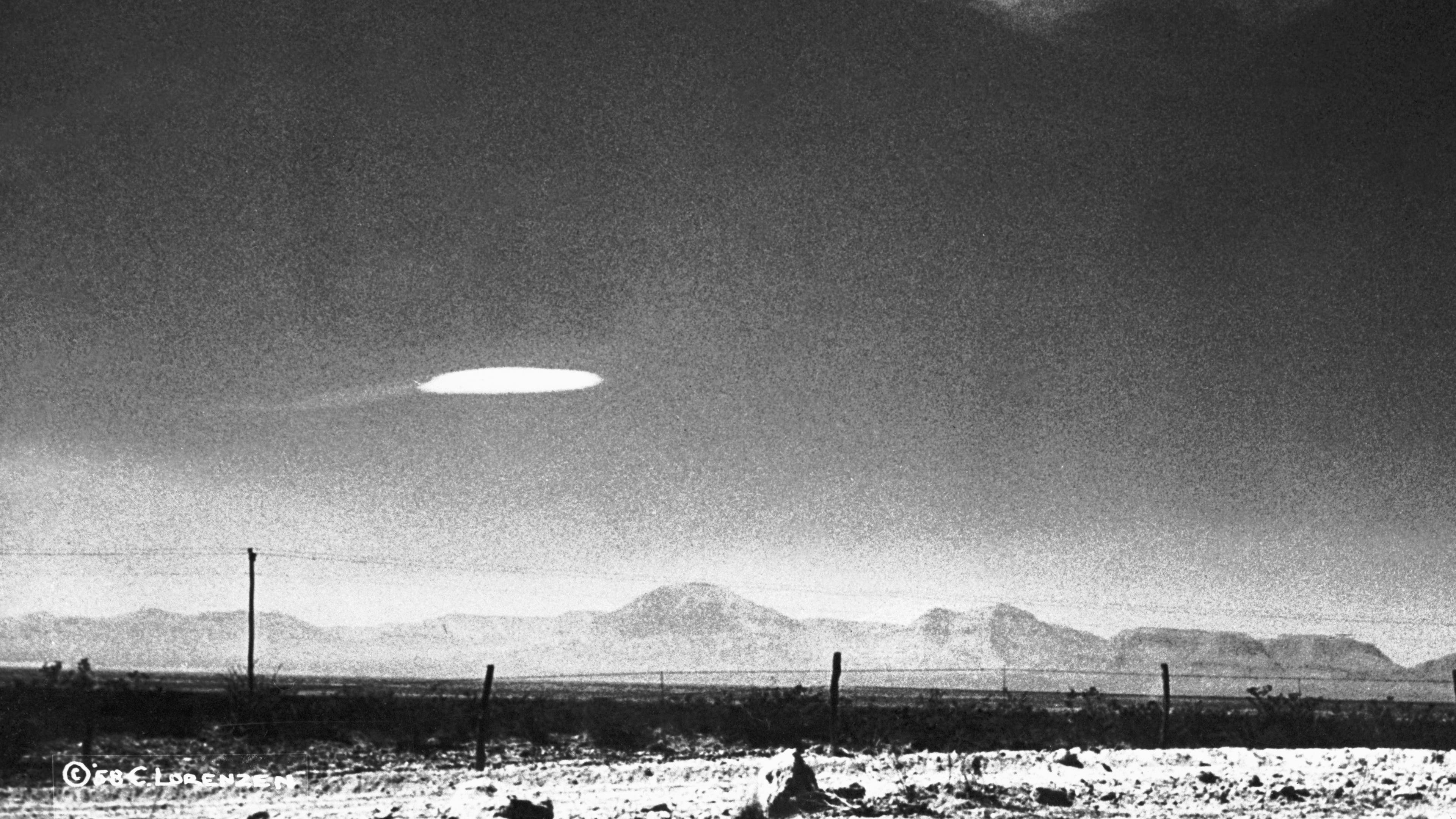 A UFO variety was photographed when it hovered for fifteen minutes near Holloman Air Development Center in New Mexico. The object was photographed by a government employee and was released by the Aerial Phenomena Research Organization after careful study. There is no conventional explanation for the object.