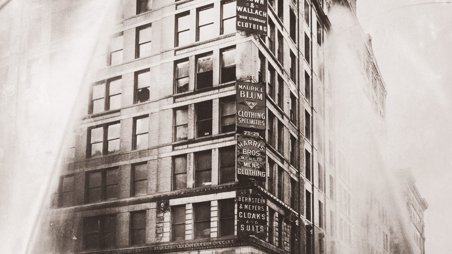 Triangle Shirtwaist Company FireFire hoses spray water on the upper floors of the Asch Building (housing the Triangle Shirtwaist Company) on Washington and Greene Streets, during the fire in New York City, March 25, 1911. (Photo by Keystone/Getty Images)