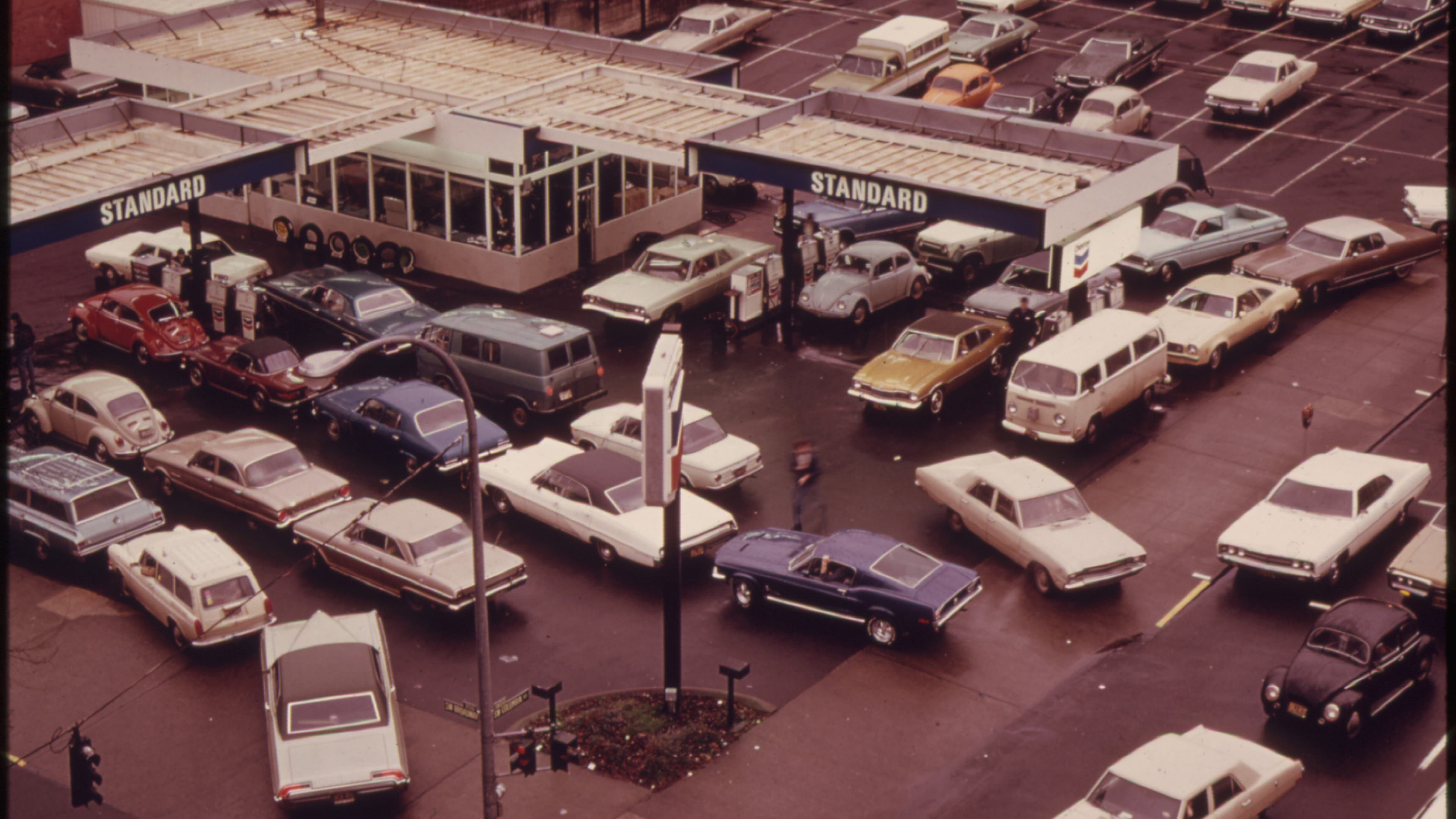 Bird's Eye View of an Average Gas Station in Portland During the Early Morning Hours of Pumping During the 1970s Energy Crisis.