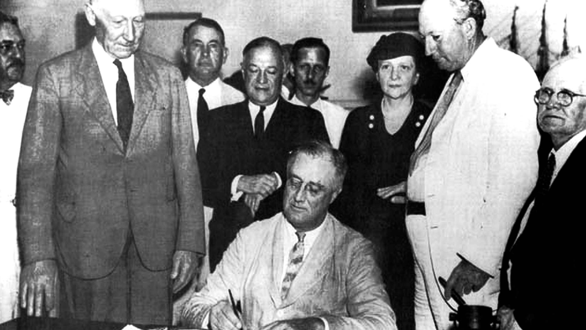 Franklin D. Roosevelt. United States President Franklin D. Roosevelt signing the Social Security Bill (Act) in 1935. (Photo by: Photo12/Universal Images Group via Getty Images)