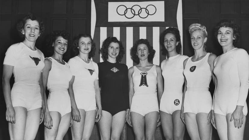 U.S. Olympic women's gymnastics team (American gymnast Ladislava Bakanic, American gymnast Marian Barone (1924-1996), American gymnast Dorothy Dalton (1922-1973), German-born American gymnast Meta Elste (1919-2010), American gymnast Consetta Lenz (1918-1980), American gymnast Helen Schifano (1922-2007), American gymnast Clara Schroth (1920-2014), American gymnast Anita Simonis (1926-2011) pose for a group portrait ahead of the 1948 Summer Olympics in London, 1948.