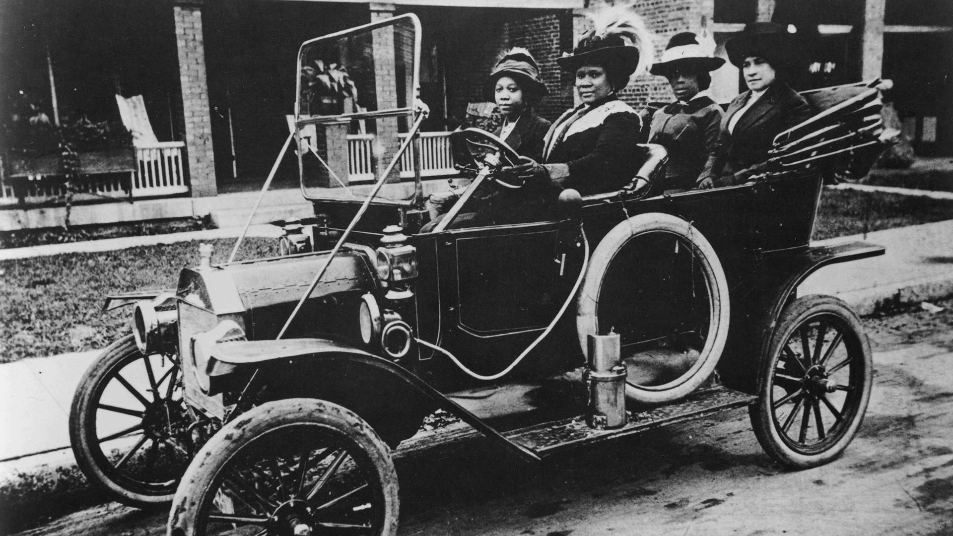 A photo of Madam C.J. Walker, the first woman to become a self-made millionaire in the United States, driving a car, circa 1911. From the New York Public Library.