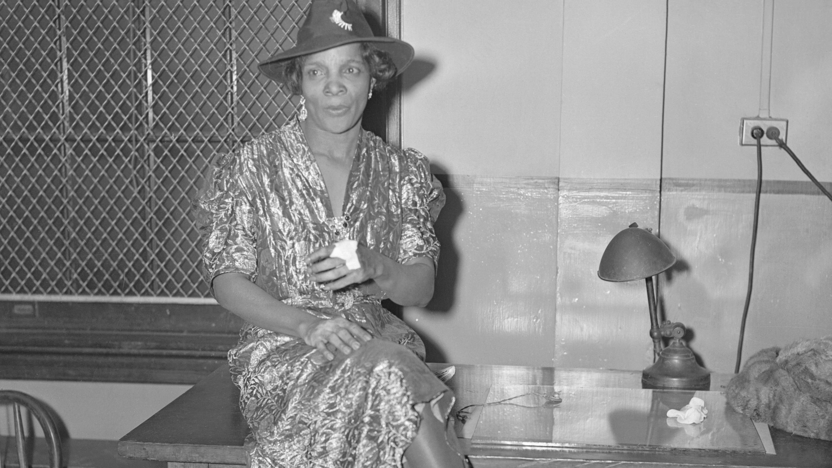 Stephanie St. Clair Hamid, the "Numbers Queen"of Harlem, being held on charges of attempted assault.