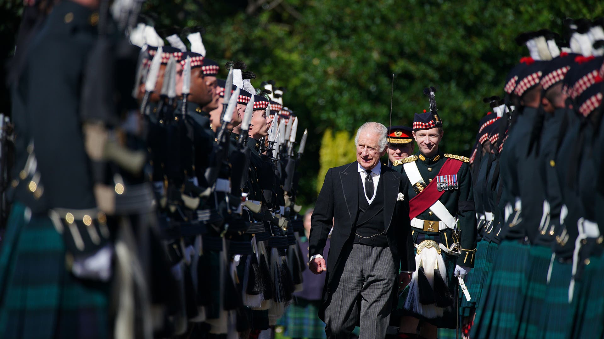 King Charles III inspects the Guard of Honour as he arrives for the Ceremony of the Keys at the Palace of Holyroodhouse, on September 12, 2022, in Edinburgh, Scotland.