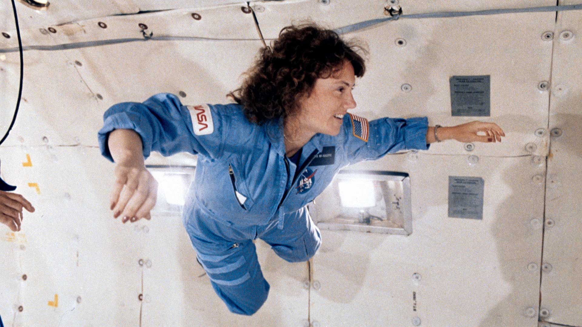 Christa McAuliffe during a microgravity flight aboard NASA's KC-135 zero-gravity aircraft, January 8, 1986.