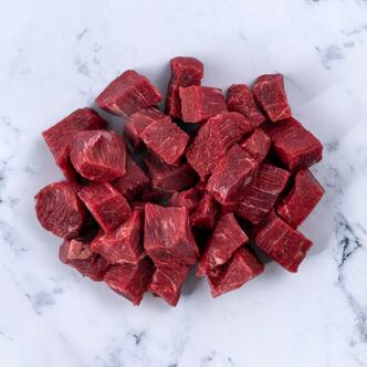 diced beef steak on marble background