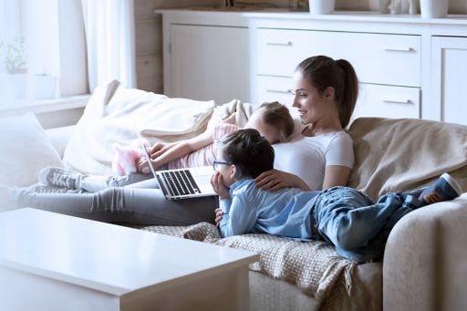 Mother and children on laptop