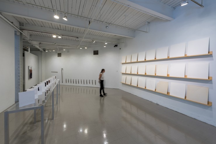 Installation consisting of large panes of plaster mounted in an exhibition space.