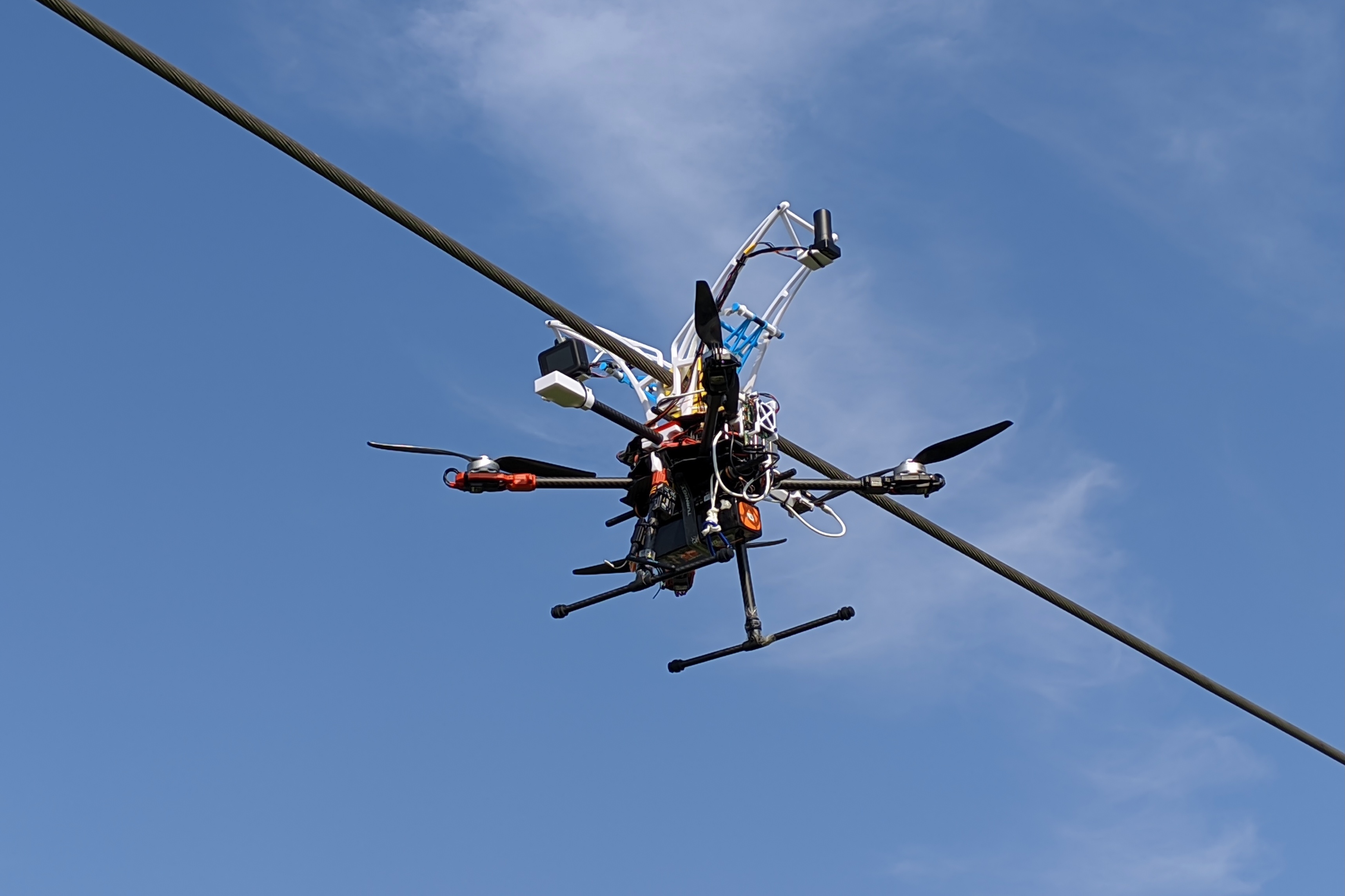 The drone is intended to draw power from lines that it's already been tasked with inspecting