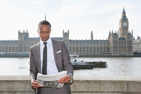 Picture of a man reading a paper - image licensed by Ingram image