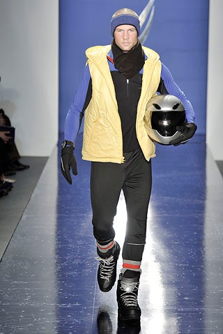 Image may contain Clothing Apparel Human Person Runway and Coat