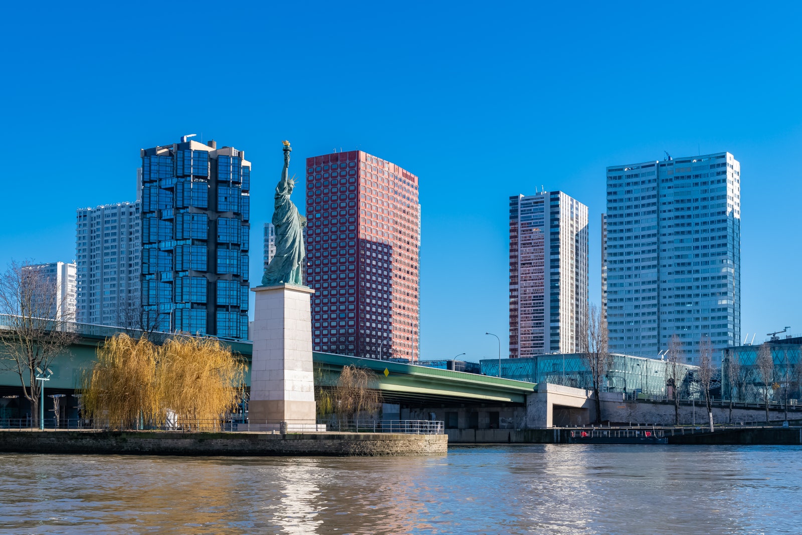 The Grenelle bridge on the Seine with one of Pariss Statues of Liberty.