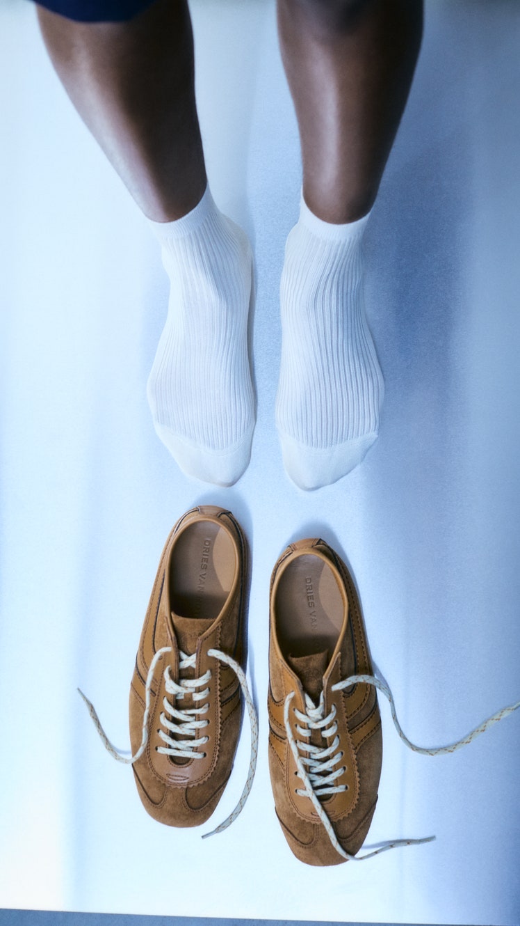 Image may contain Clothing Footwear Shoe Sneaker Hosiery Sock and Person