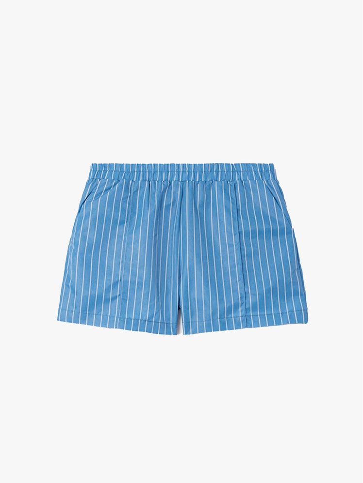 Image may contain Clothing Shorts Skirt and Swimming Trunks