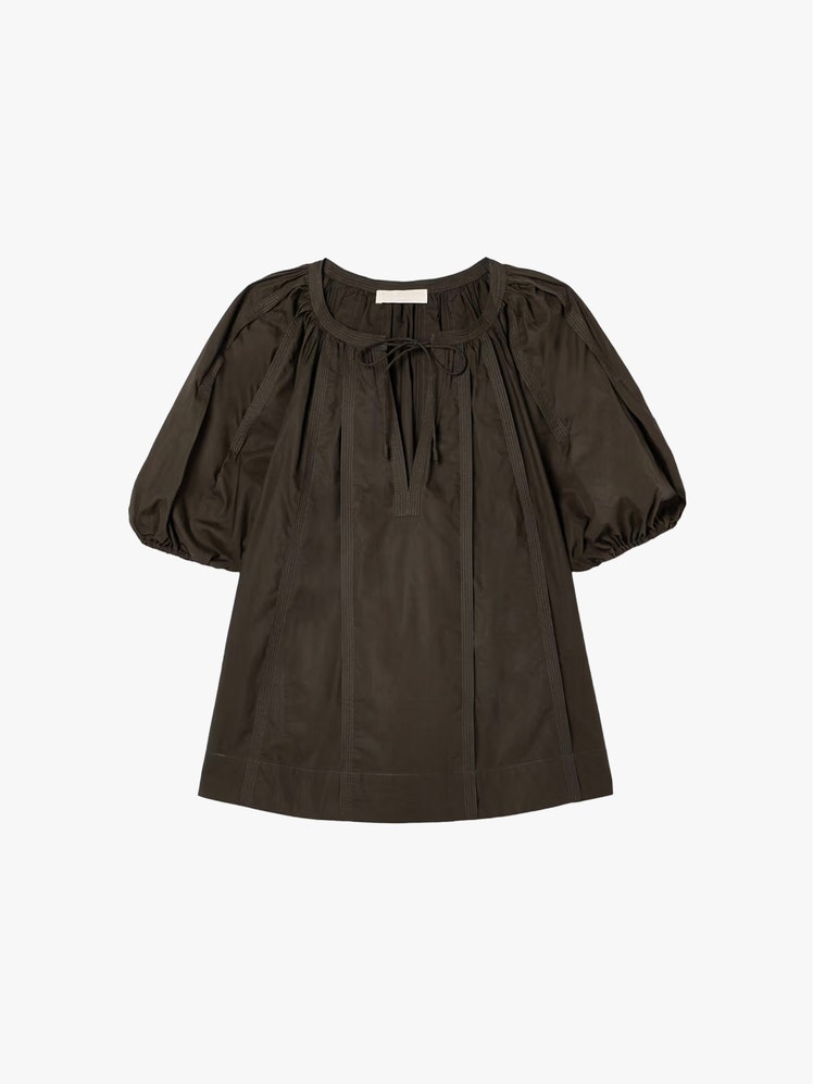 Image may contain Blouse Clothing and Coat