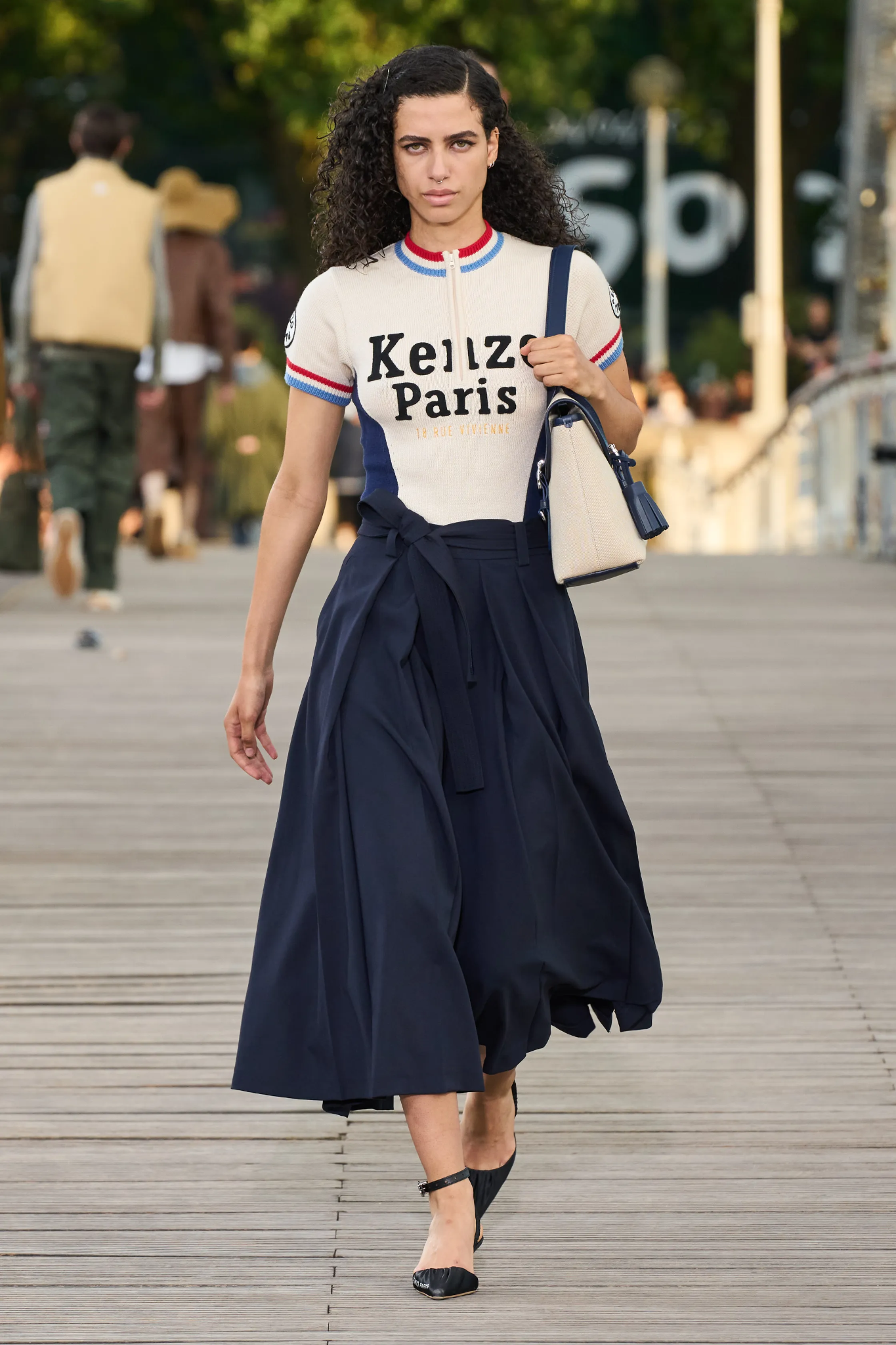 Image may contain Adult Person Fashion Clothing Skirt and Sleeve