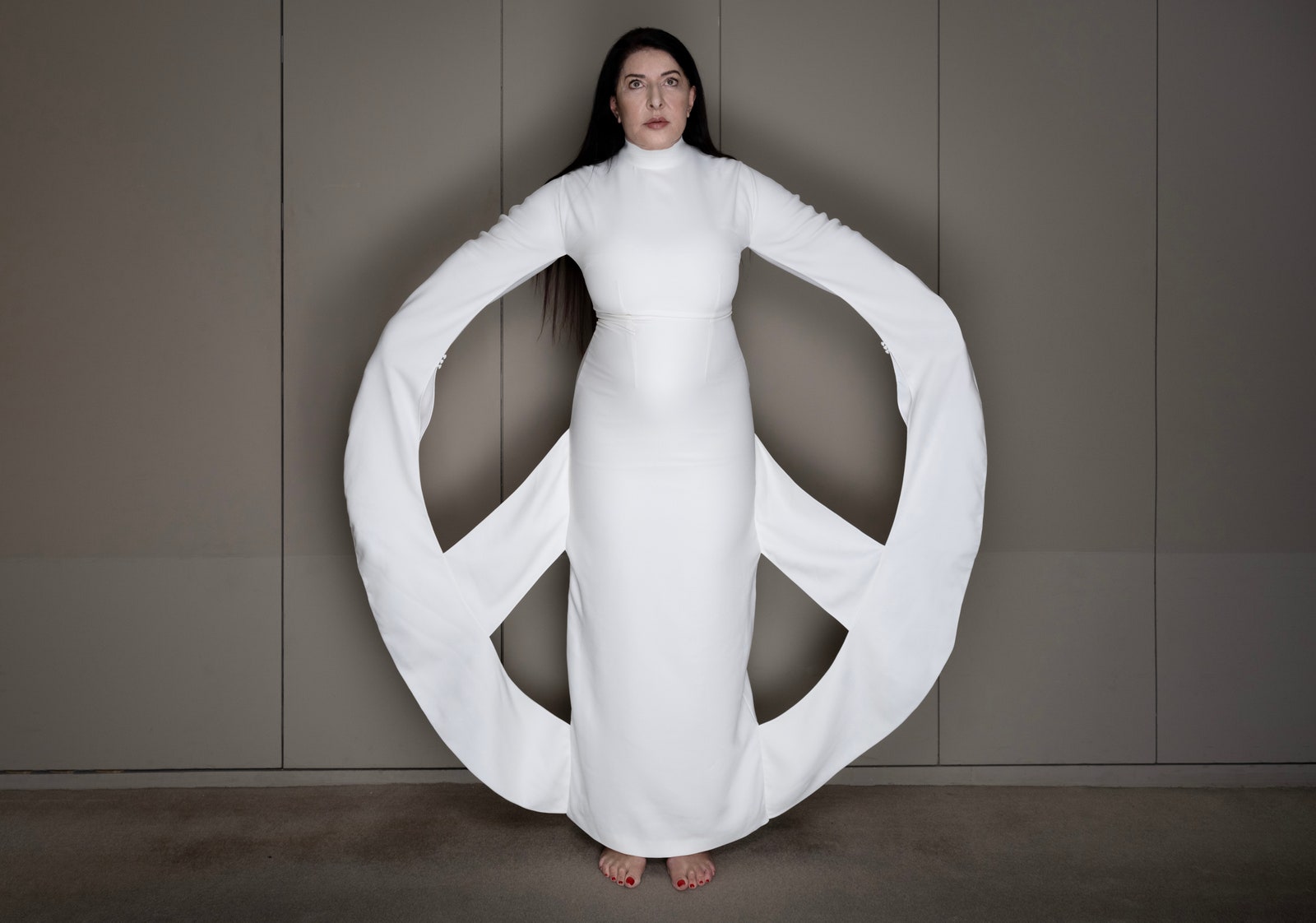 Image may contain Marina Abramović Clothing Long Sleeve Sleeve Dress Fashion Formal Wear Gown Adult and Person