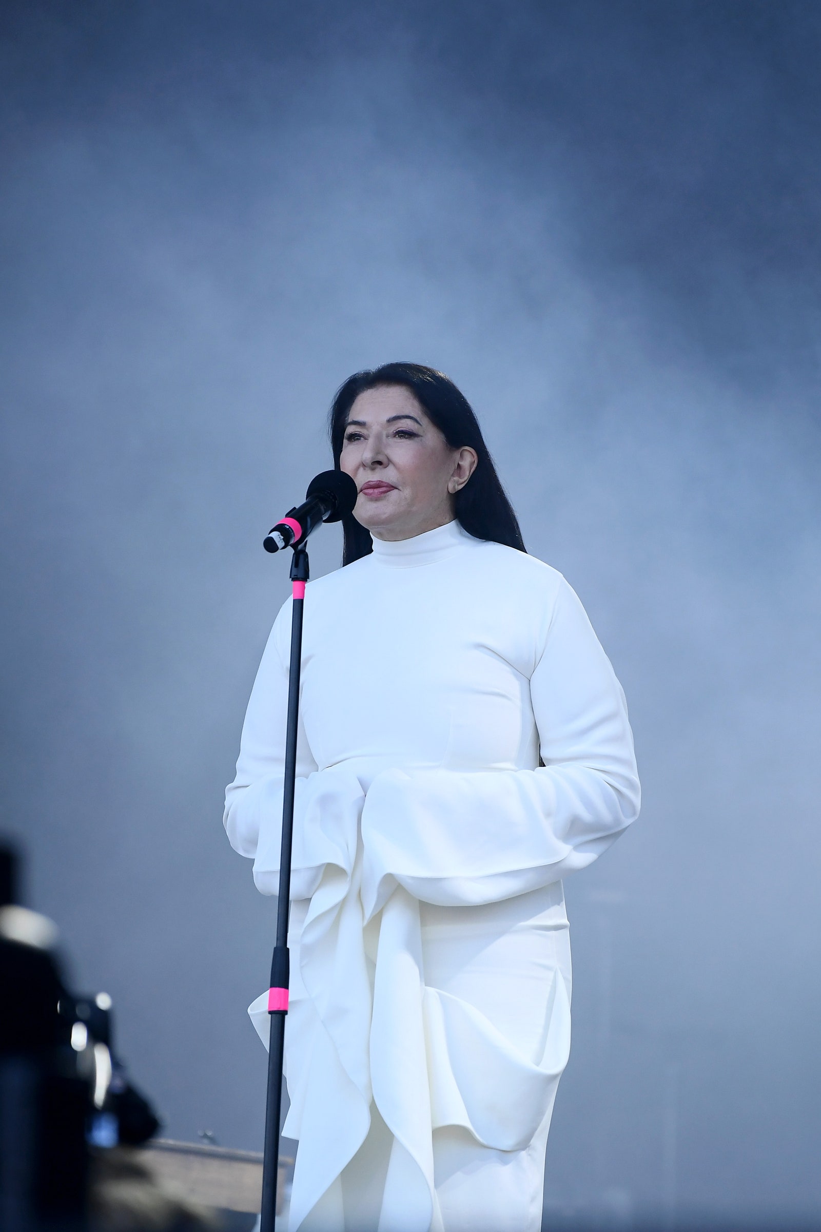 Image may contain Marina Abramović Adult Person Crowd Electrical Device Microphone Performer and Solo Performance