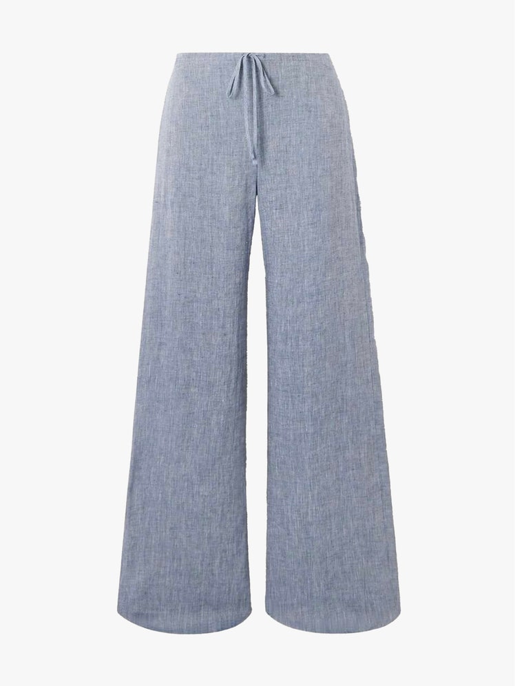 Image may contain Clothing Pants Jeans Home Decor and Linen