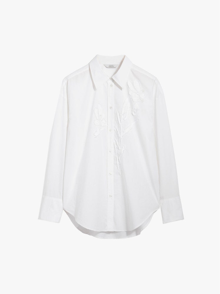 Image may contain Clothing Shirt Blouse Long Sleeve Sleeve and Dress Shirt