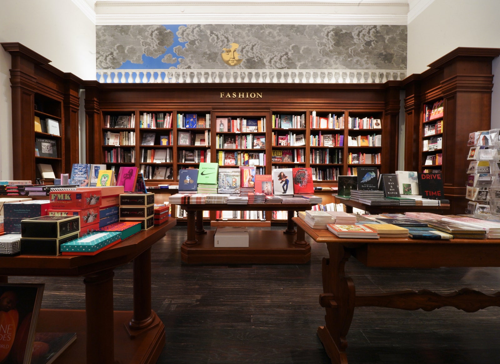 Image may contain Book Publication Desk Furniture Table Bookstore Shop Indoors Library Art Painting and Person