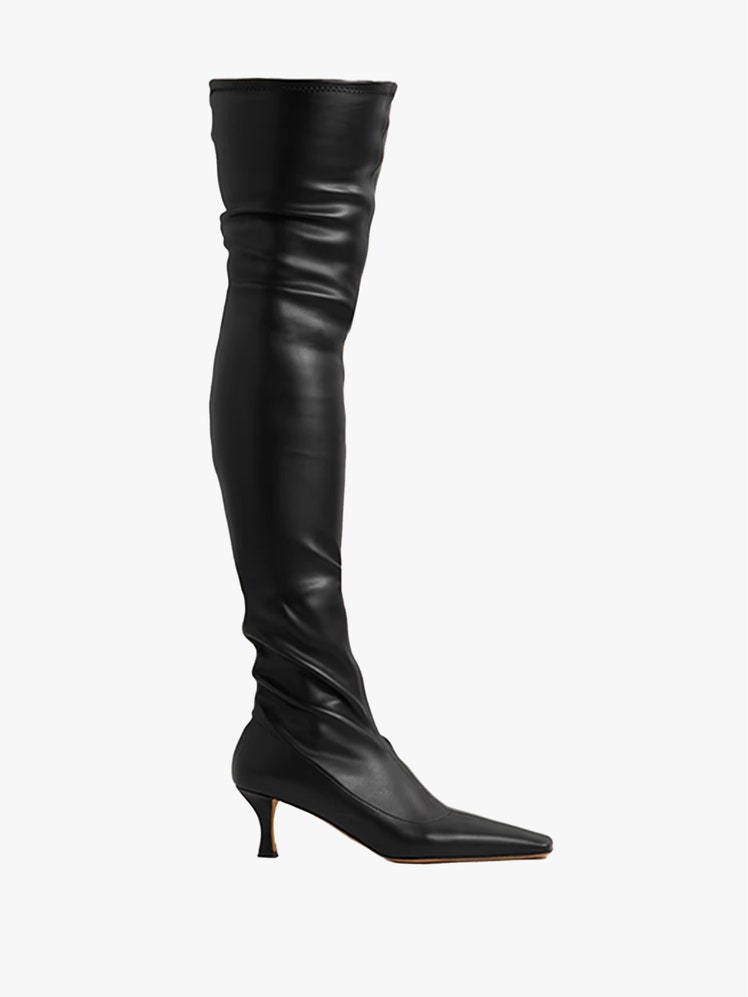 Image may contain Clothing Footwear Shoe High Heel Boot and Riding Boot