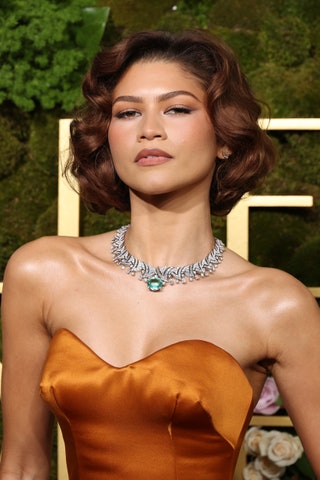 Image may contain Zendaya Clothing Dress Evening Dress Formal Wear Accessories Jewelry Necklace Head and Person