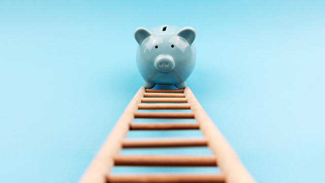 Piggy Bank Climbing a Stair 