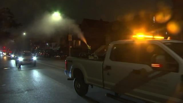 A truck sprays pesticides in Brooklyn to combat mosquito activity. 