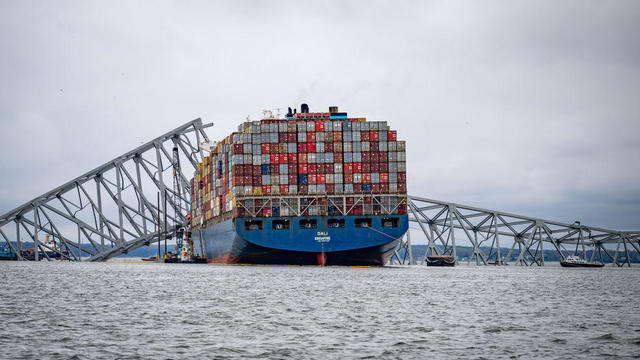 The container ship Dali is seen in the wreckage of Francis Scott Key Bridge almost a week after it hit a structural pier causing a subsequent bridge collapse, April 1, 2024. 