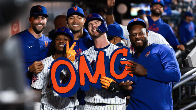 Pete Alonso #20 of the New York Mets poses in the dugout after hitting a three-run home run during the sixth inning of the game against the Washington Nationals at Citi Field on September 17, 2024 in New York City. 