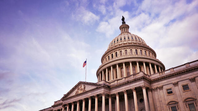 US Capitol building dome with American flag 