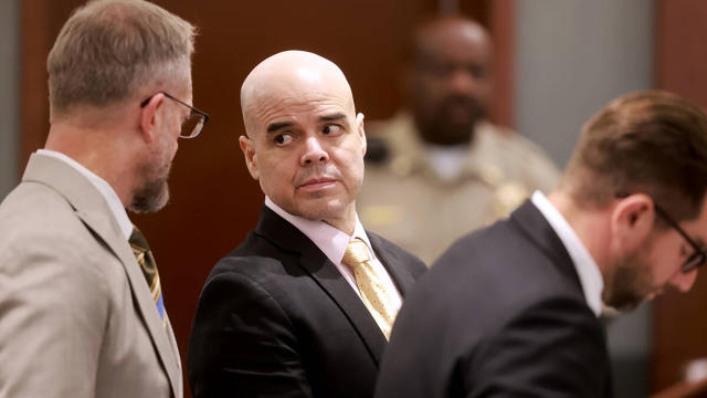 Robert Telles, center, is flanked by his attorneys Robert Draskovich, left, and Michael Horvath during his murder trial at the Regional Justice Center in Las Vegas, Aug. 23, 2024. 