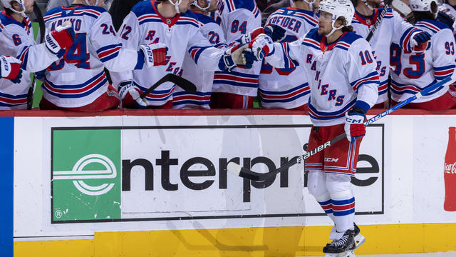 Artemi Panarin #10 of the New York Rangers celebrates his goal with teammates on the bench against the Detroit Red Wings during the first period at Little Caesars Arena on October 17, 2024 in Detroit, Michigan. 