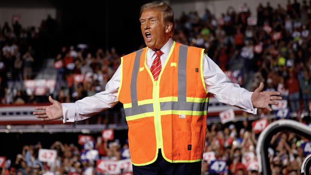 Republican presidential nominee, former President Donald Trump greets supporters during a campaign event at the Resch Center on October 30, 2024 in Green Bay, Wisconsin. 