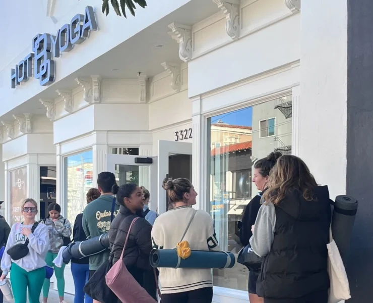 a line outside Hot 8 Yoga's new location in San Francisco