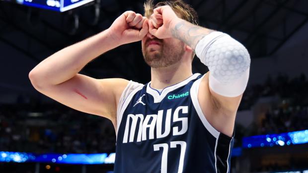 Mar 17, 2024; Dallas, Texas, USA; Dallas Mavericks guard Luka Doncic (77) reacts during the second half against the Denver Nuggets at American Airlines Center.