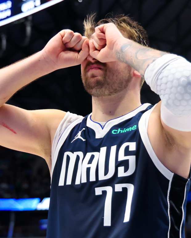 Mar 17, 2024; Dallas, Texas, USA; Dallas Mavericks guard Luka Doncic (77) reacts during the second half against the Denver Nuggets at American Airlines Center.