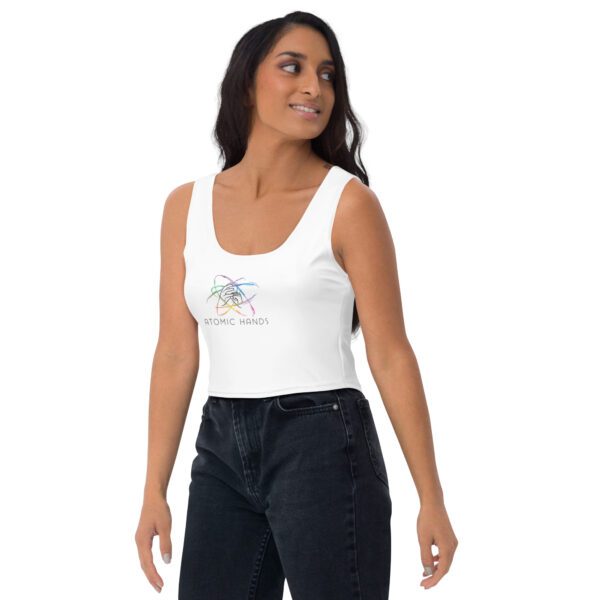 Female model wearing white crop top with Atomic Hands logo in the middle