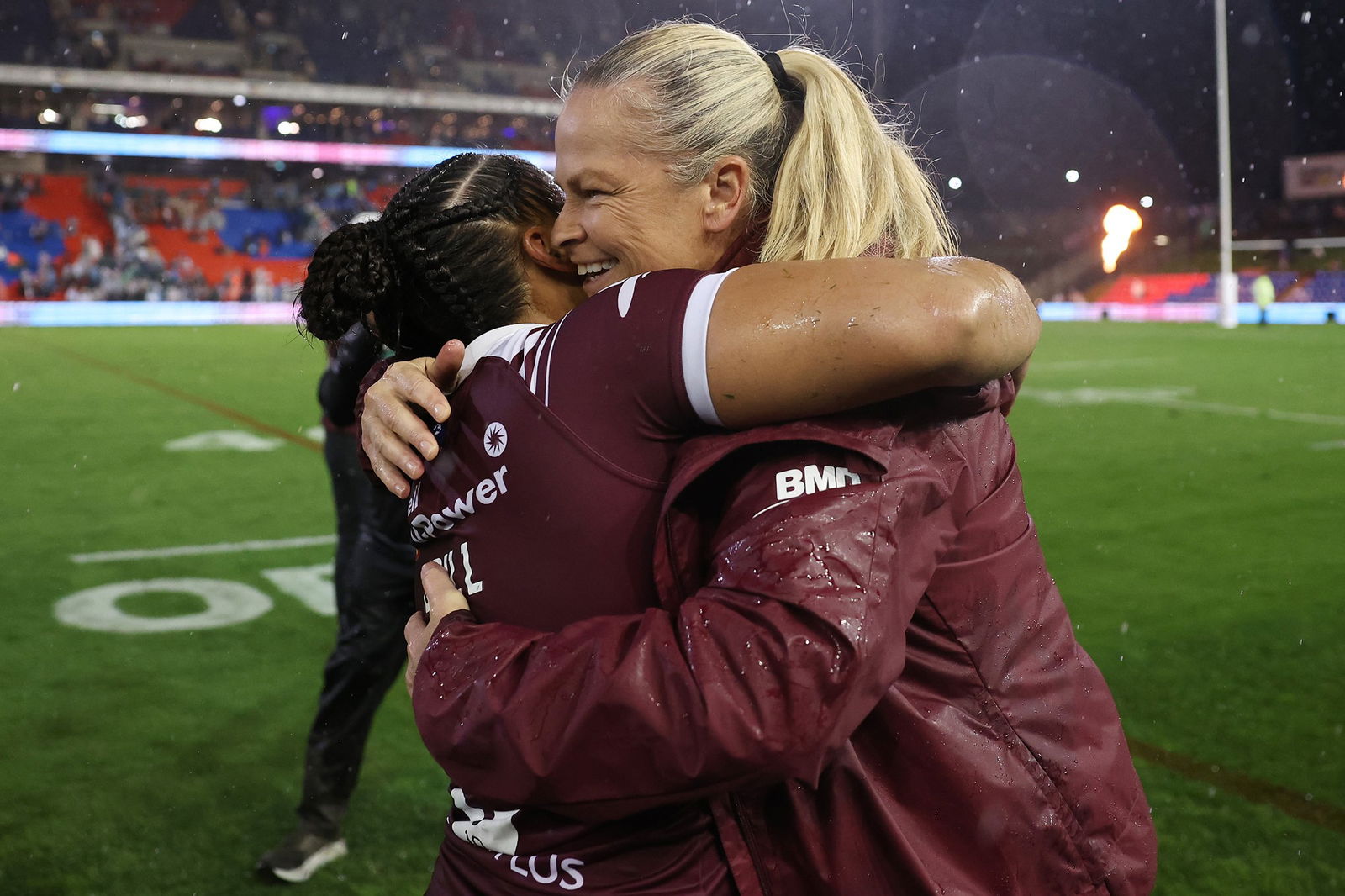 Queensland Maroons coach Tahnee Norris hugs player Destiny Brill.