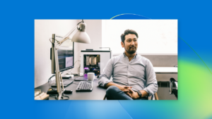 Man sitting next to desk