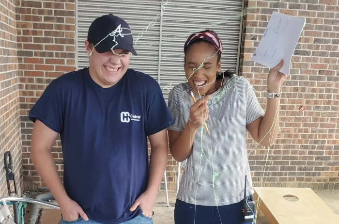 Students celebrating with silly string