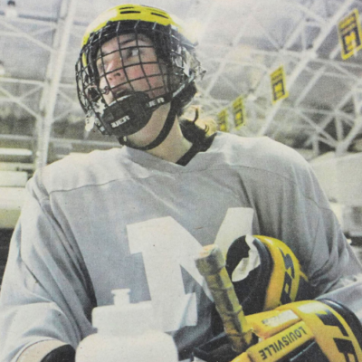 A woman student at U-M playing Ice Hockey in the 1990s.